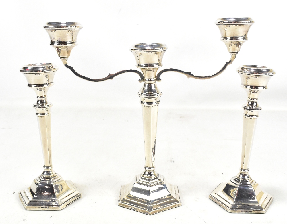 SANDERS & MACKENZIE; an Elizabeth II hallmarked silver three sconce candelabra, Birmingham 1969,