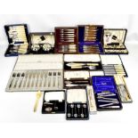 A large quantity of cased plated flatware.