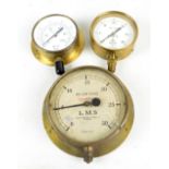 Three brass gauges comprising an L.M.S vacuum gauge reservoir and pressure gauge, also a brake