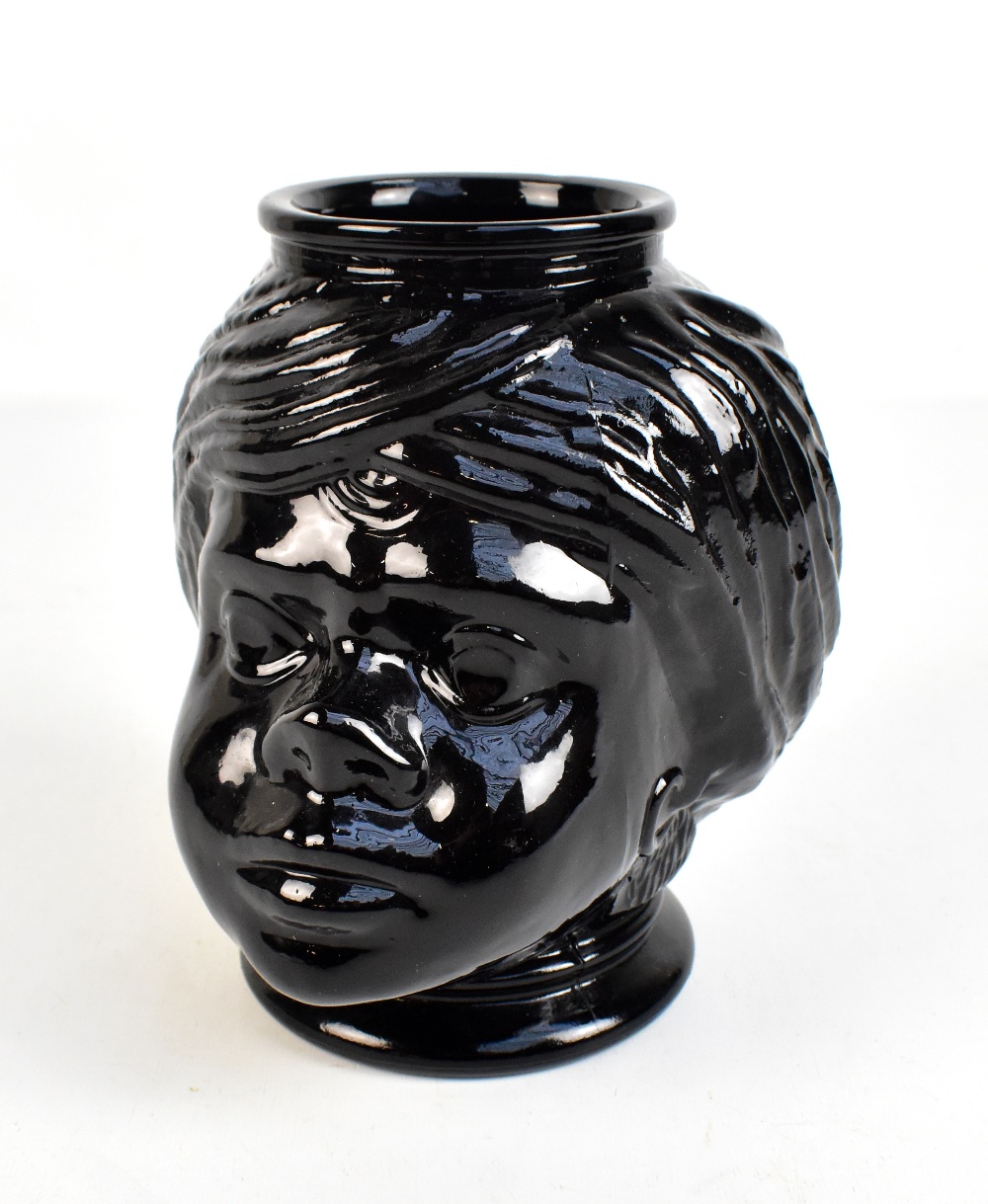 An unusual American black glass cookie jar modelled as the bust of a lady, unmarked, height 20cm.