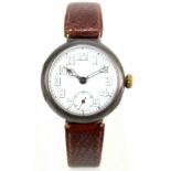 ROLEX; a hallmarked silver gentleman's wristwatch, the enamelled circular dial set with Arabic