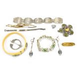 A small group of costume jewellery including a late Victorian yellow metal brooch, 9ct yellow gold