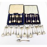 A group of variously hallmarked silver items to include two cased sets of teaspoons, and loose