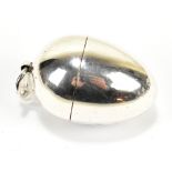 THOMAS WILLIAM DEE; a Victorian hallmarked silver egg shaped string dispenser, London 1870, approx