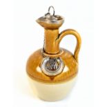 BUCHAN OF PORTOBELLO EDINBURGH; a stoneware flask with silver mounts hallmarked for Chester 1904,