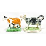 A 19th century spongeware cow creamer, height 10cm, and a later cow creamer (2).Additional