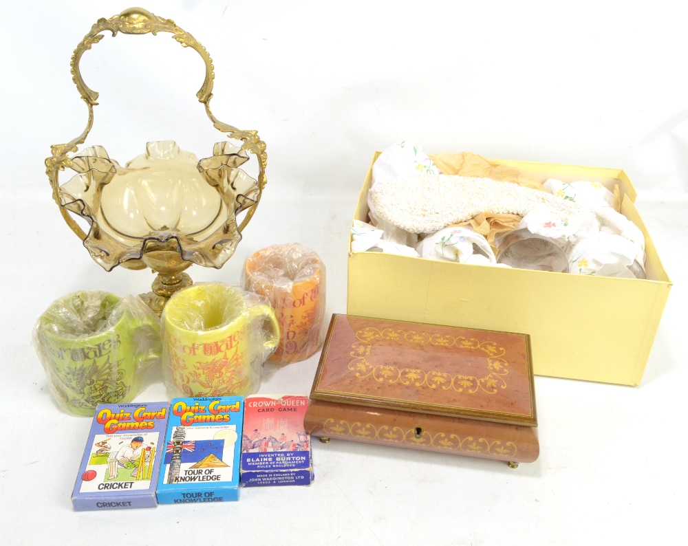 A gilt metal and glass table centrepiece, a set of reproduction air twist glasses, a musical