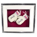 SIR HENRY COOPER; a pair of Lonsdale signed white boxing gloves, presented in box, framed and