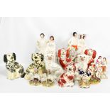 A group of Victorian and Edwardian Staffordshire figures including a large pair of flatback figures,