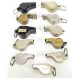Eleven railway whistles comprising nine 'The Acme Thunderer' examples stamped for various train