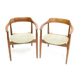 AFTER ARNE WAHL IVERSEN; a set of four elm ST750 arm chairs mid-century teak framed armchairs raised