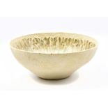 BETTY BLANDINO (1927-2011); a stoneware bowl with iron decoration and cobalt pooling to well,