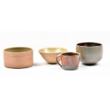 Leach Pottery; a salt glazed bowl and cup and two stoneware bowls with green glaze to interiors,