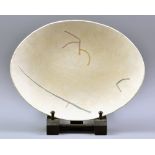 SUSAN DISLEY; an oval stoneware dish with incised decoration, incised SM (for Susan Mason) and dated