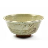 HENRY HAMMOND (1914-1989); a stoneware footed bowl decorated with iron brushwork on green/grey