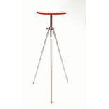 A mid-20th century stand with shaped formica top on tripod base, height approx 95cm.