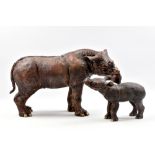 SUSAN CLAIRE PAGE (born 1952); two stoneware animal sculptures, 'Sumatran Rhino and Calf', impressed