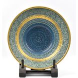 MARTIN HOMER (born 1945); a stoneware dish with sprigged and gilded decoration, incised signature,