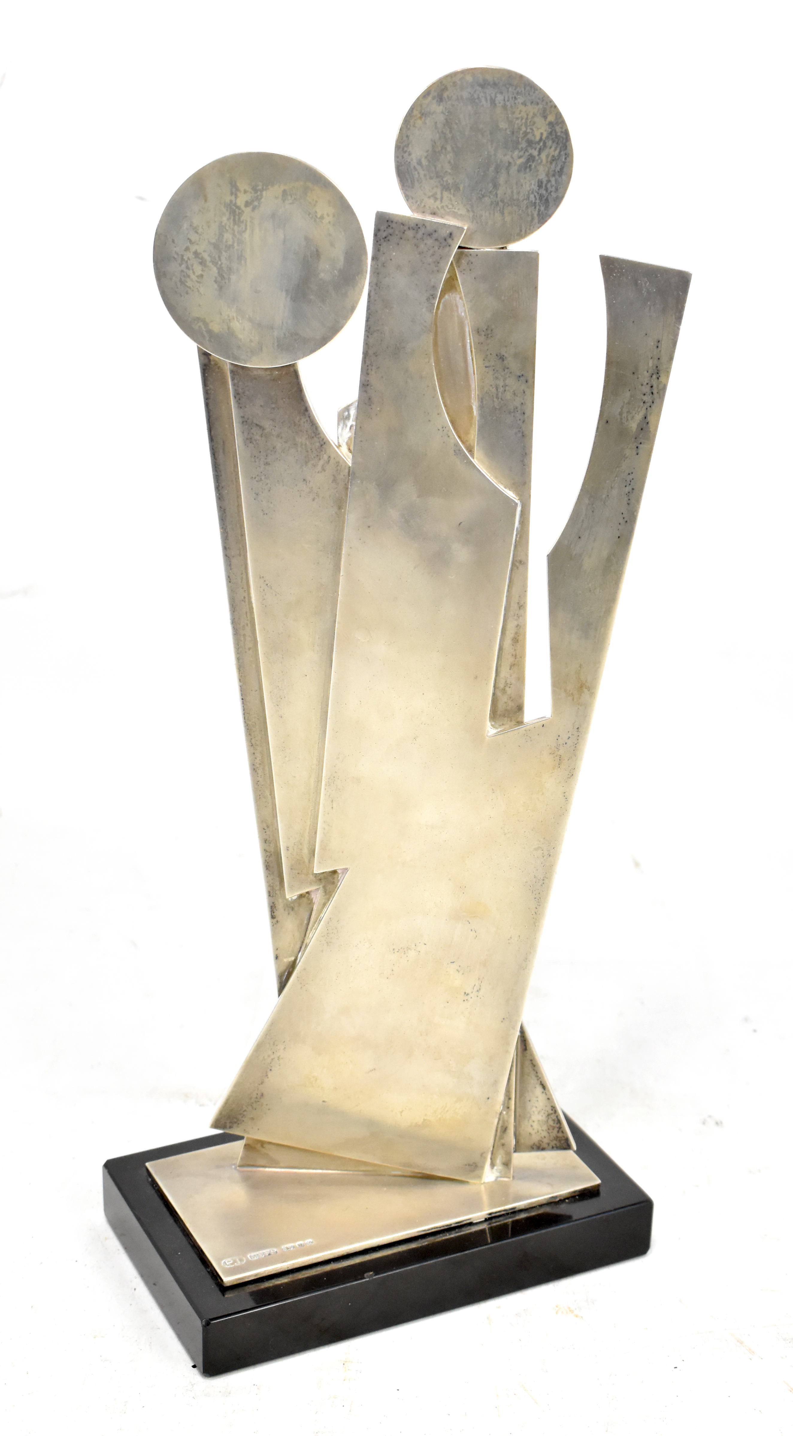 PETER THURSBY (1930-2011); a contemporary silver sculpture, 'Optimism', raised on a polished
