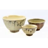 JIM MALONE (born 1946); three faceted stoneware footed bowls, two with brush decoration on cream