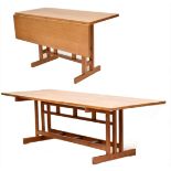 RICHARD LA TROBE-BATEMAN (born 1938); a large oak dining room table with drop leaf extension, the