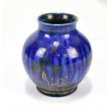 WILLIAM S MYCOCK FOR ROYAL LANCASTRIAN; a lustre vase of bulbous form, painted with floral sprays on
