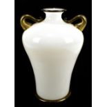 BAROVIER & TOSO; a Murano milk glass twin handled vase, the rims and handles with gold leaf detail