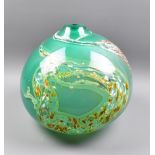 A large bulbous green glass vase with trailed and mottled decoration, height 28cm.