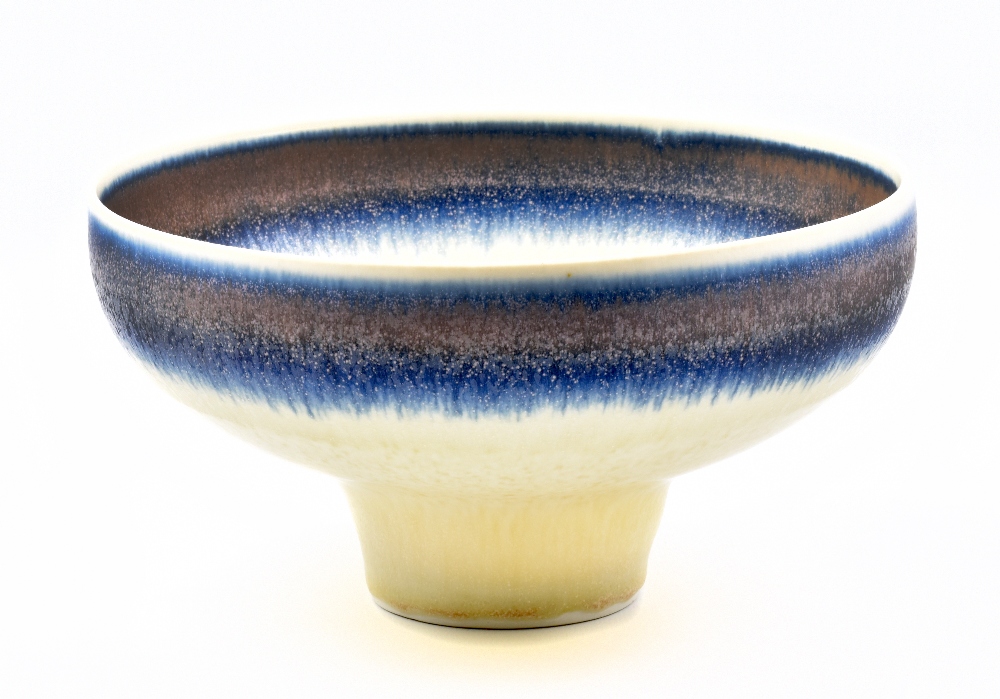 HAZEL JOHNSTON (1933-2011); a porcelain pedestal bowl, whiting slip and brushed cobalt and bronze