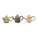HWANG JENG-DAW (born 1963); three wood fired miniature stoneware teapots with ash glaze