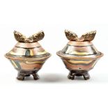SUZY ATKINS; a pair of stoneware footed bowls and covers, soda glazed with gold embellishments,