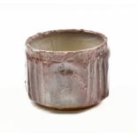 HWANG JENG-DAW (born 1963); a wood fired stoneware footed tea bowl with incised decoration and