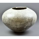 STEPHEN MURFITT (born 1953); a large round raku vessel with stepped rim covered in white glaze