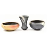 JOHN LEACH (born 1939) for Muchelney Pottery; a 'Black Mood' tapered vase and lugged bowl, and a