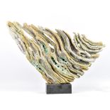 WENDY LAWRENCE; 'Large Winged Form', a carved stoneware sculpture layered with textured volcanic