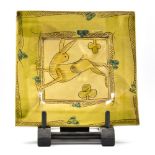 NIEK HOOLGAND (born 1953); a square slipware footed platter decorated with a rabbit, incised
