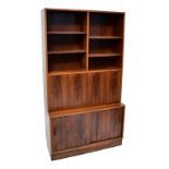 POUL HUNDEVAD (1917-2011); a Danish rosewood bureau bookcase, the upper section with four adjustable