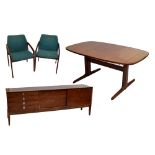 A rosewood dining suite comprising Dyrlund extending dining table with one extra leaf, six Danish