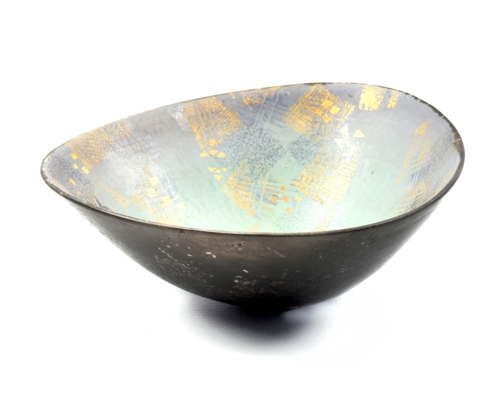 ANNE JAMES (born 1937); a triangular raku dish with lustrous decoration, incised AJ mark, diameter