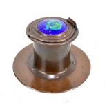 JESSON BIRKETT; an Arts and Crafts copper inkwell, the cover with blue and green enamel cabochon
