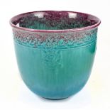 ROYAL LANCASTRIAN; a green glazed jardinière with relief Celtic knot design with purple glazed