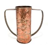 JOHN WILLIAMS; an Arts and Crafts twin handled copper vase with repoussé decoration depicting fish