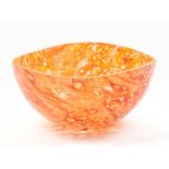 KJELL ENGMANN FOR KOSTA BODA; a large glass bowl with mottled red and yellow detail, signed and
