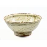 RUPERT SPIRA (born 1960); an early stoneware footed bowl with fish decoration to well, impressed