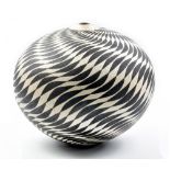 ILONA SULIKOVA (born 1949); a raku vessel decorated with black waves, height 27.5cm.Additional