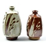 MARK GRIFFITHS (born 1956); two square stoneware bottles, kaki over white slip and white and red