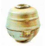 JACK DOHERTY (born 1948); a ribbed porcelain pot covered in soda vapour glaze, impressed mark (glaze