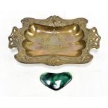 An Art Nouveau green glazed ceramic cabochon in the form of a love heart, possibly Ruskin, length