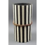 GILLIAN MONTEGRANDE (born 1960); a cylindrical stoneware vessel, 'Imperial', black vulcan and red