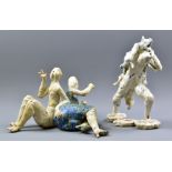 MICHAEL FLYNN (born 1947); two stoneware sculptures of a female figure carrying a wolf skin and a